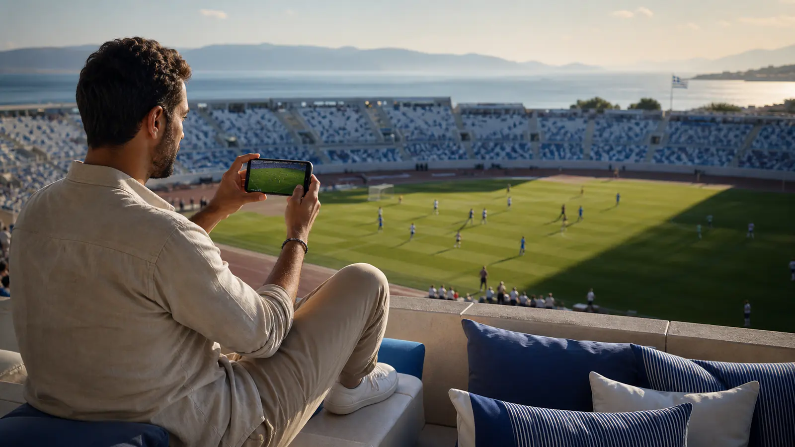 Adepto usa a aplicação BetLabel durante uma partida de futebol ao vivo